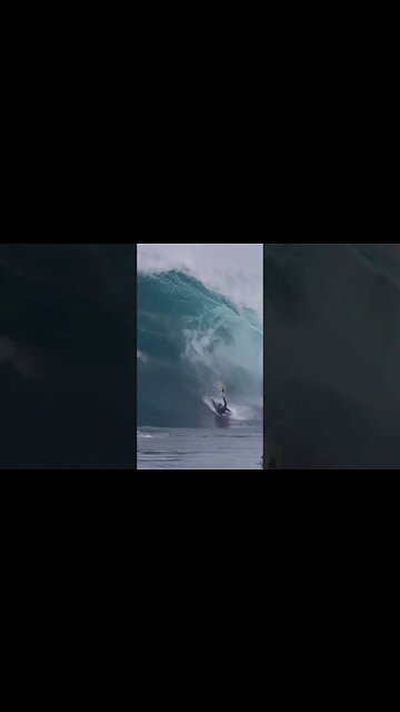 Big surge caught a surfer and nearly a jetski! Insane ride!