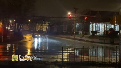 Drenching the roads on a rainy night in St. John's, NL