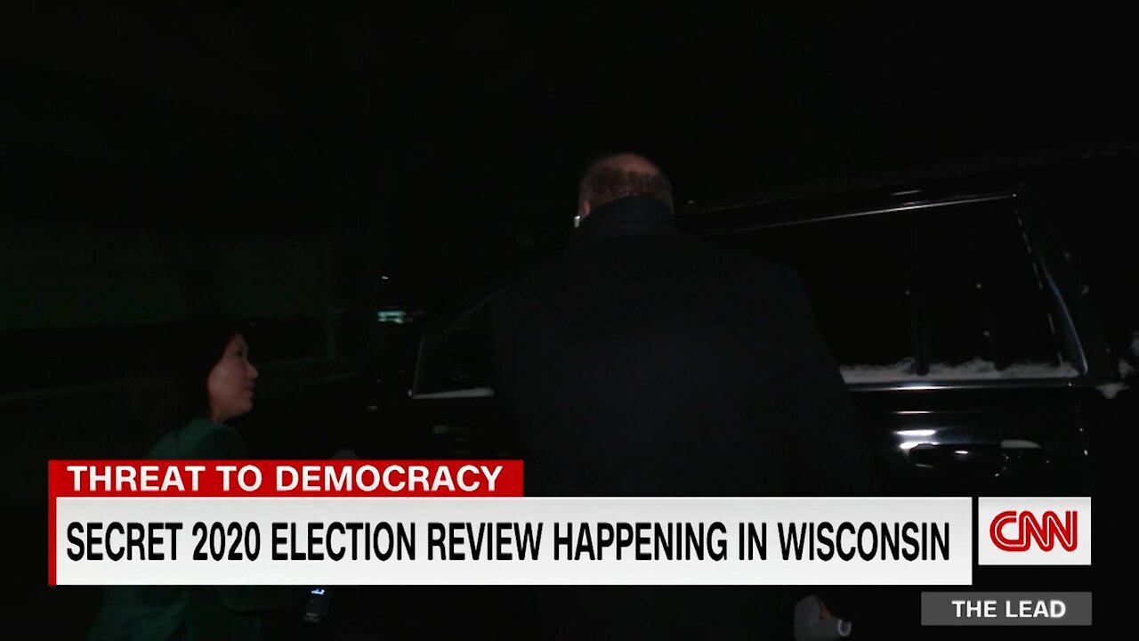 Retired judge dodges CNN reporter's questions about election review.