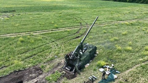 Overhead view of a 2S7M "Malka" 203mm artillery taking a shot