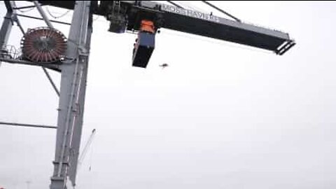 Man jumps off crane to promote sports festival