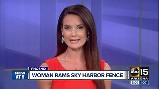 Woman accused of ramming into Sky Harbor fence