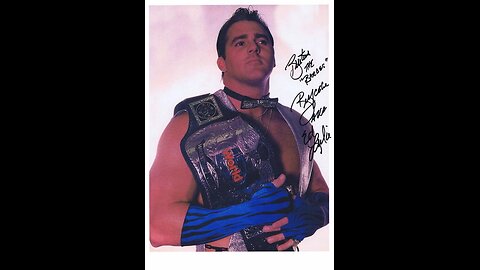 1984-tito Santana match-Brutus beefcake struts his stuff at ringside