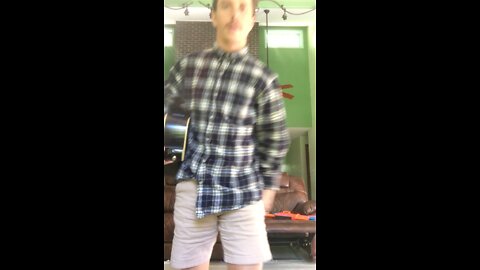 Singing acoustic guitar