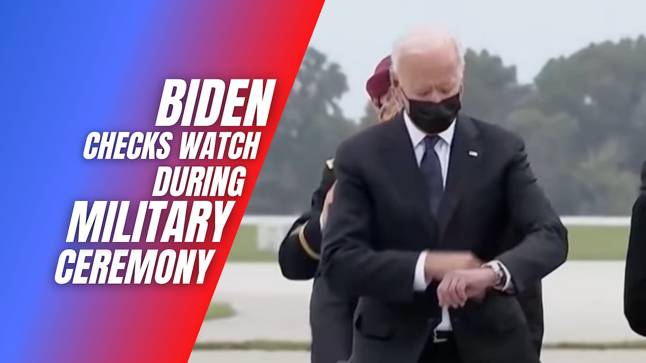 Biden Checks Watch During Ceremony for Fallen Troops