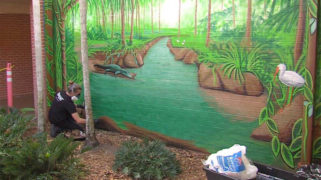 Colorful murals beautify the walls of Wellington Landings Middle School