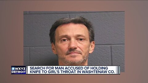 Police search for suspect who held knife to 7-year-old's throat during robbery in Washtenaw Co.