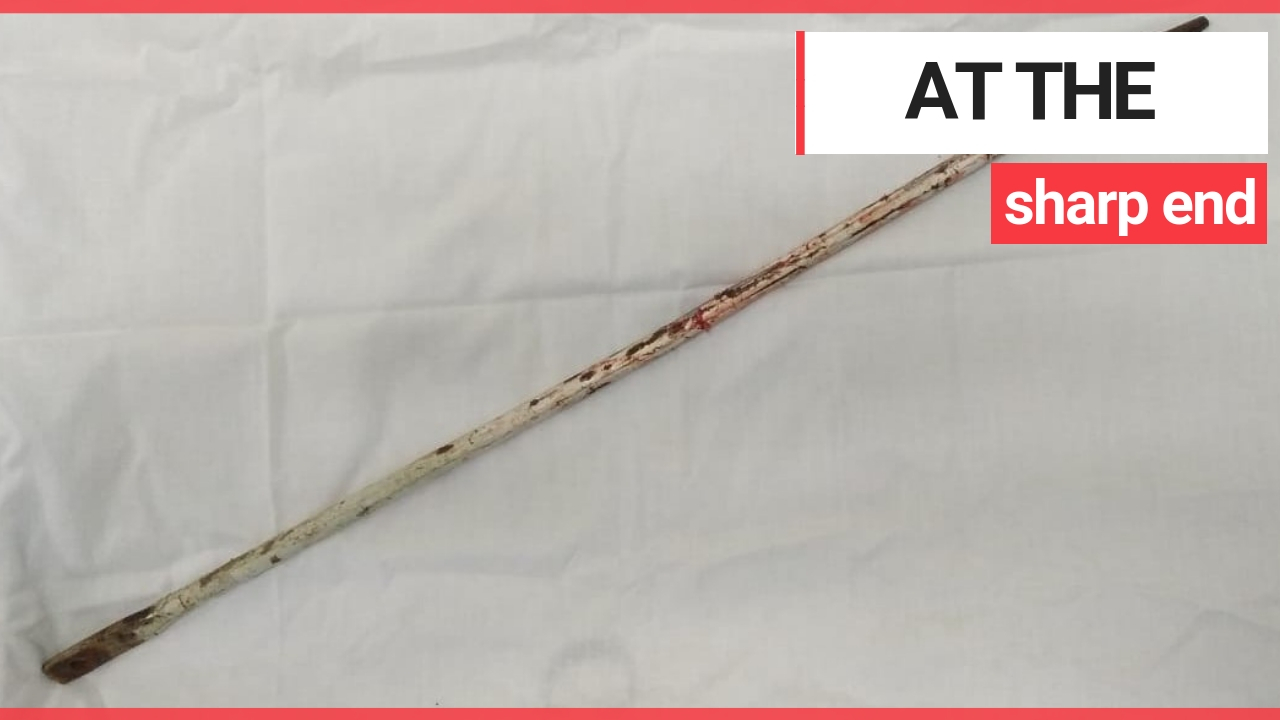 A motorcyclist was impaled on a metal spike from his own bike