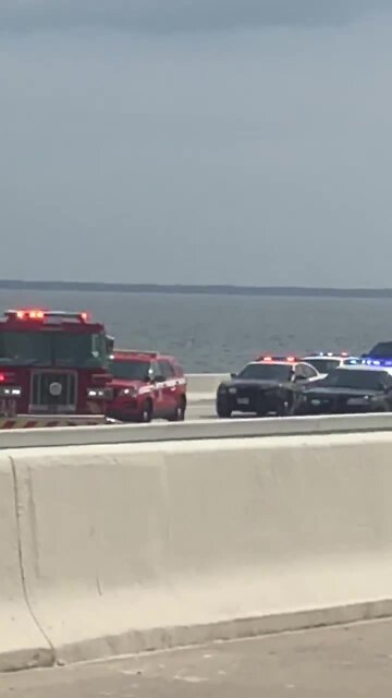 Crews respond to crash that ended with people jumping off the bridge