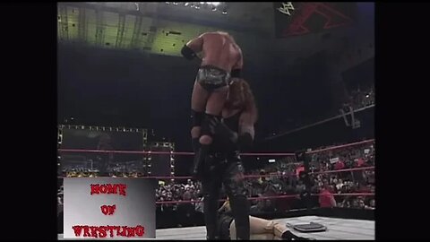 The undertaker Chokeslams Vince McMahon , Triple H then stone cold - Insurrextion UK 2001