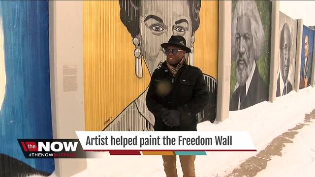 Local artist helped paint the Freedom Wall