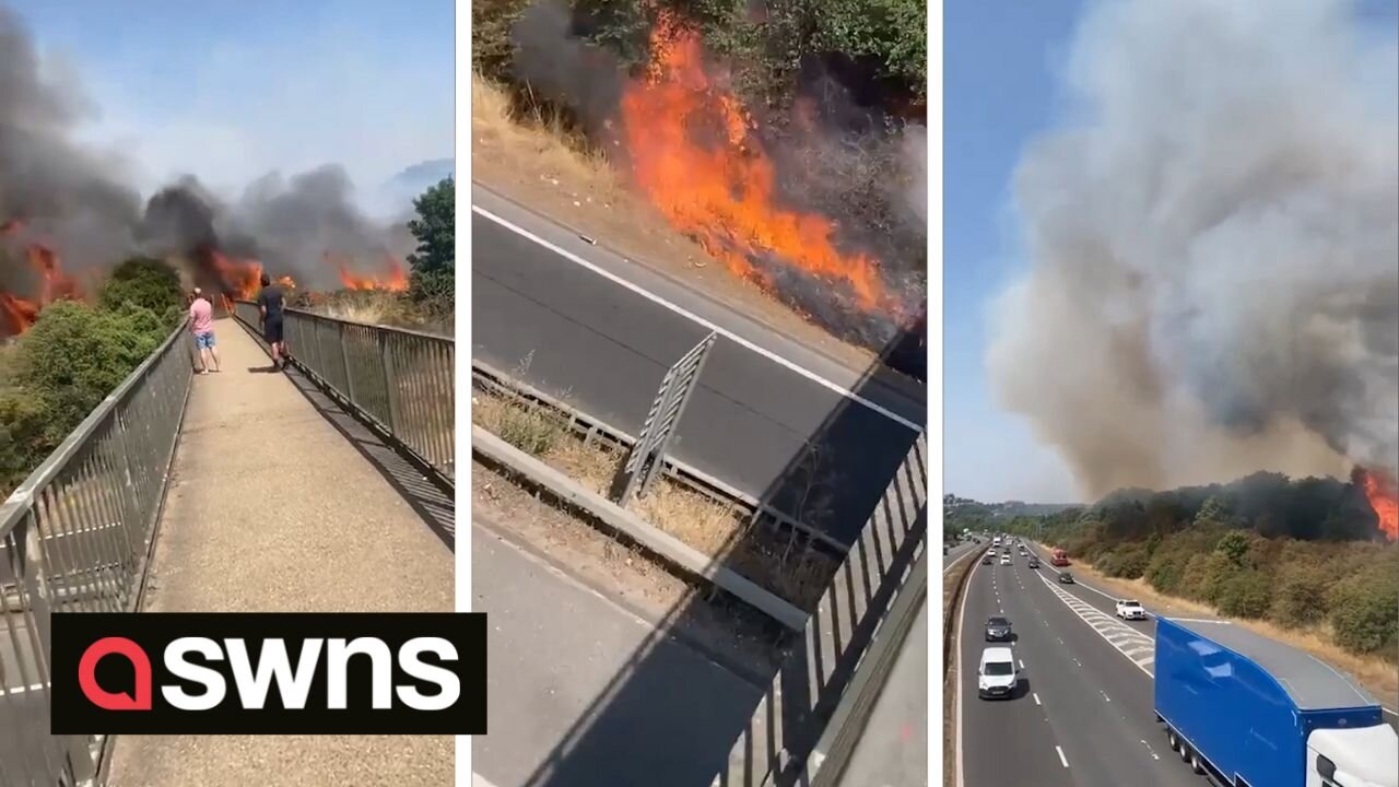 Shocking videos show a huge fire raging alongside the A2 motorway in Dartford, UK