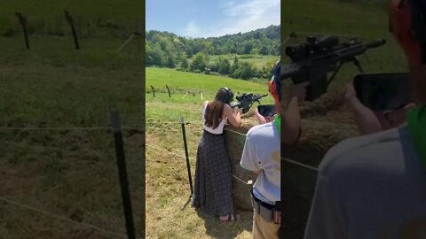 Tiny Lady Shoots 50 BMG