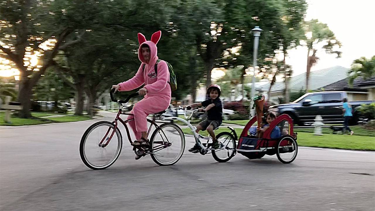 Jupiter widower bikes to school in bunny getup; works to make life after loss as normal as possible