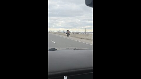 Riding Bike On The Highway