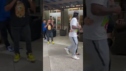 Dreaded black dude is happy with a his fatty lol