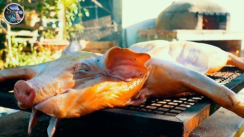 Lechón al horno de barro para una navidad en familia