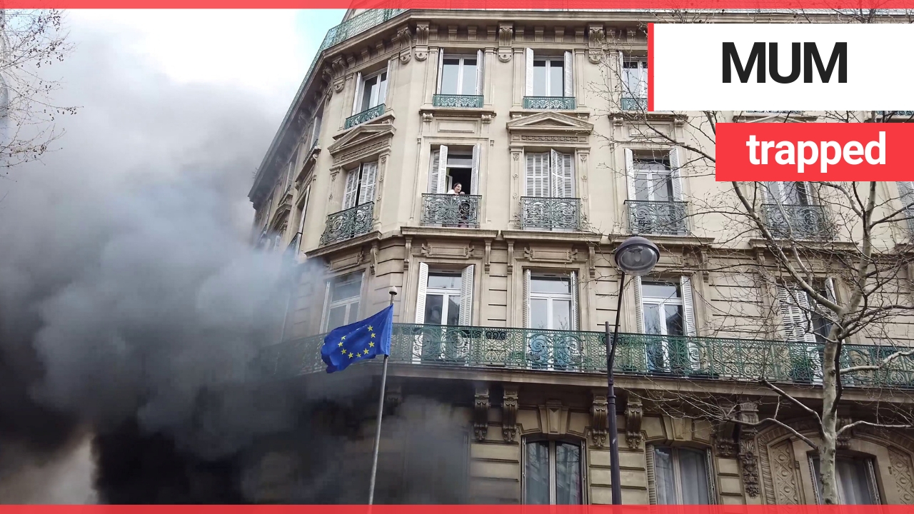 Mum holding baby screamed from second floor window of burning building