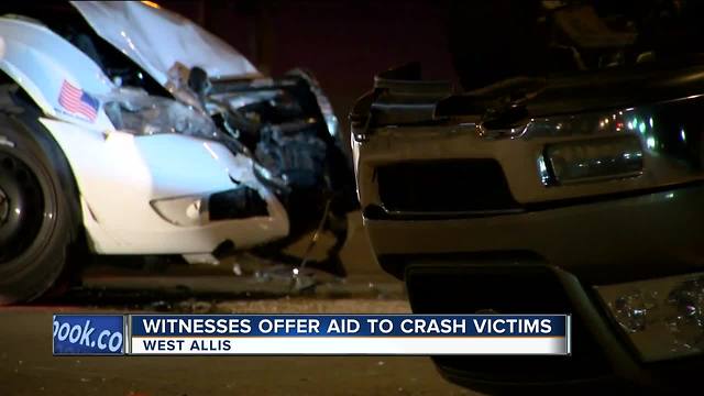 Police squad car, pick-up truck crash leaves 4 injured in West Allis