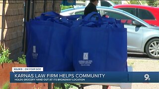Karnas law firm hands out groceries to families in need