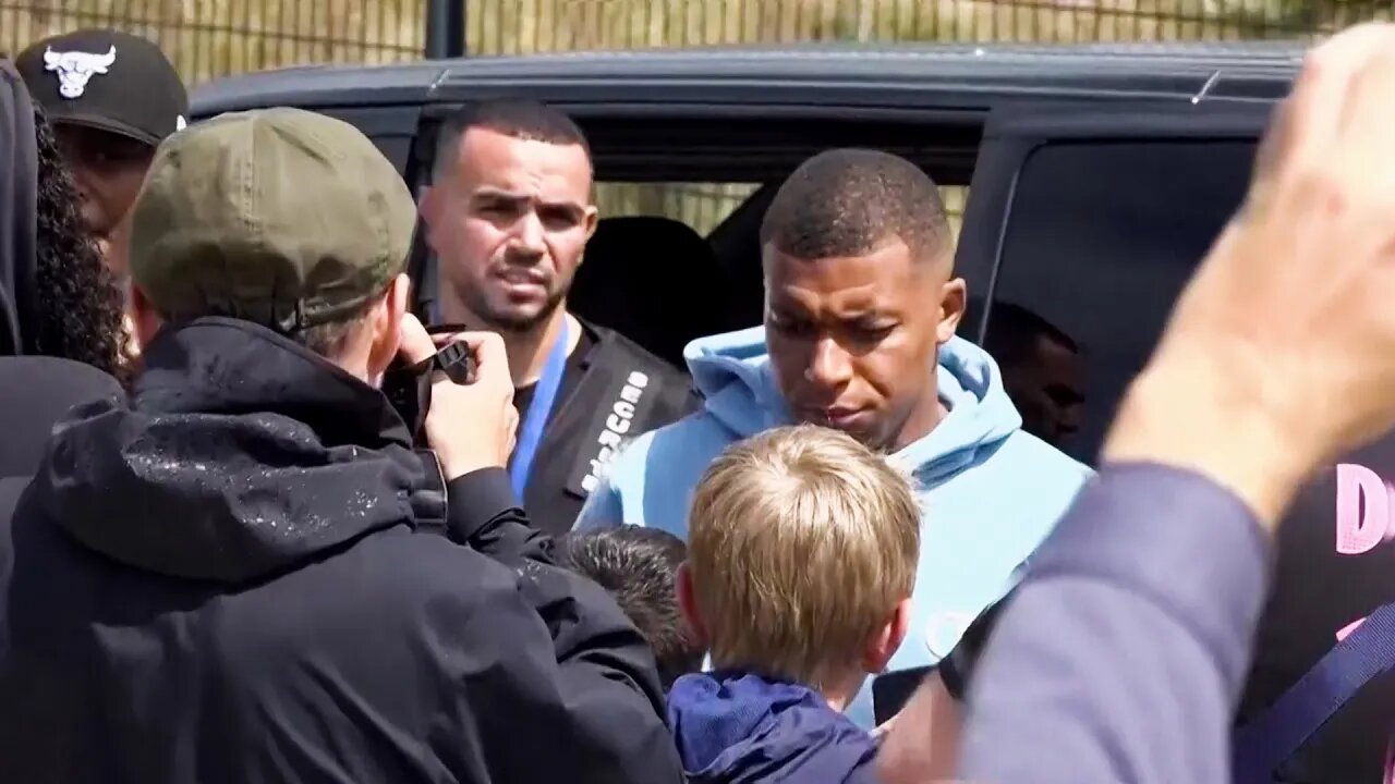 Mbappe signs autographs for fans after PSG training amid exit speculation