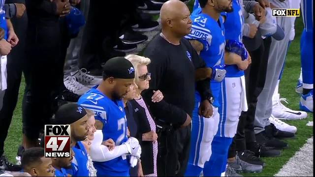 Some Lions kneel, team links arms in response to Trump
