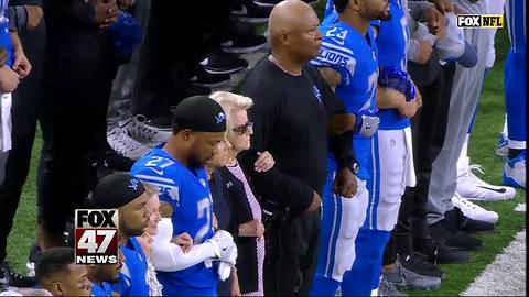 Some Lions kneel, team links arms in response to Trump