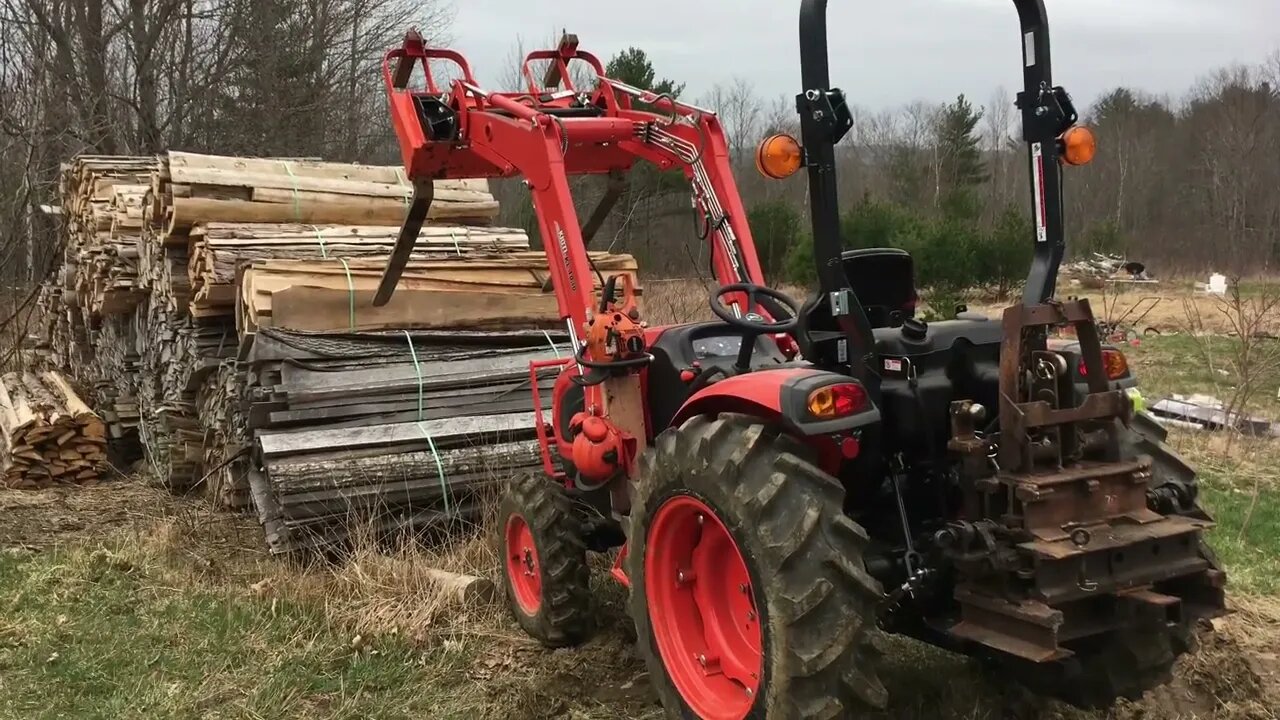 Kioti CK3510 lifting oak slabs