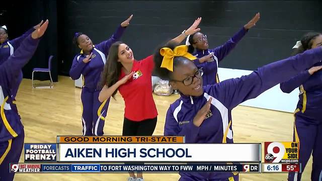 WCPO's Ben-Gal Jaclyn DeAugustino learns an Aiken High School cheer