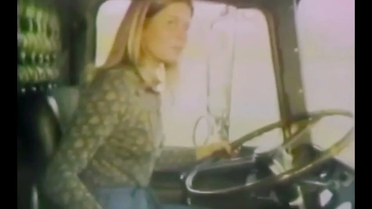 The girl in the cabover Mack!