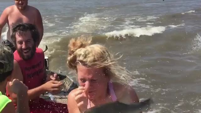 Fish Jumps Out Of The Water And Hits Woman In The Face