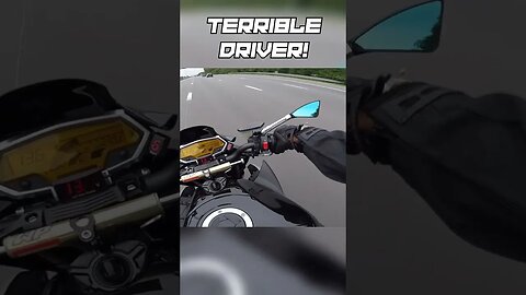 Terrible driver CUTS OFF biker!