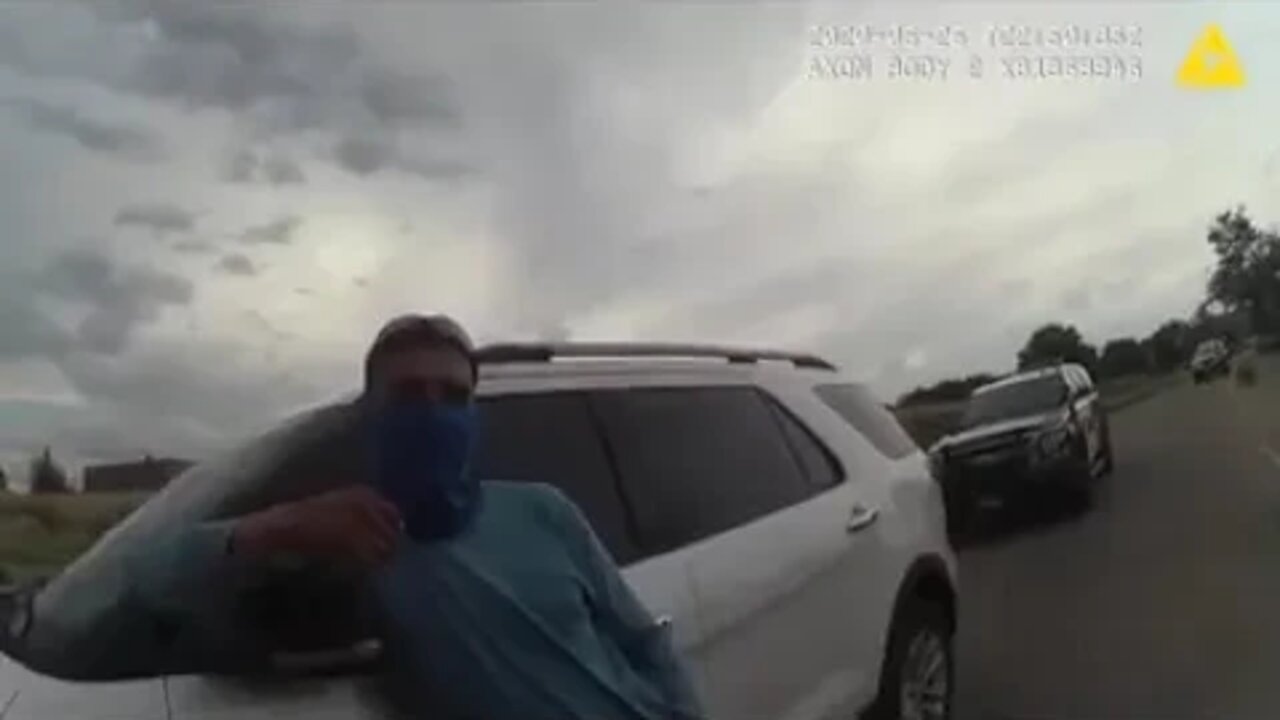 nazi police dislocates an elderly womans shoulder with a metal challenges.