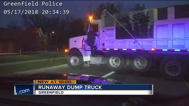 Greenfield officer, Good Samaritan help driver passed out in moving dump truck