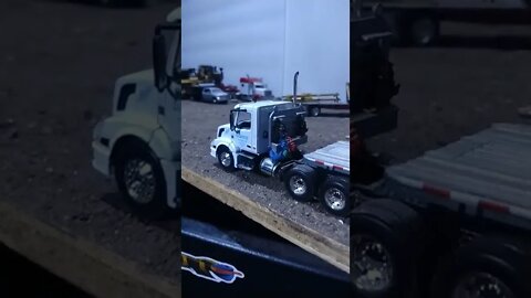 D.M. Bowman Volvo VNL300 1/64 DCP by First Gear Truck Stop and Heavy Equipment Yard Diorama