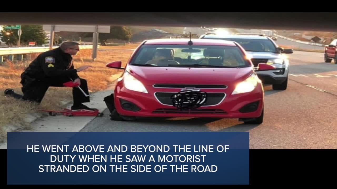 When woman got flat tire, a Virginia officer's grandpa instincts kicked in