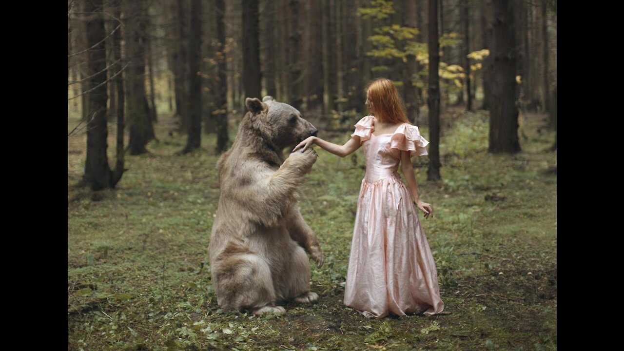 Shocking video from Russia. Wild bear dancing with a girl