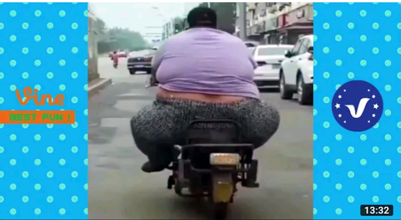 A Fat man Riding a small bike