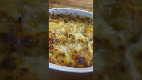 Smashed tatoes boiledsmashed buttered cheddered bakedthen graved and mozzarellafied baked again