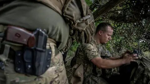 Fighters of Ukraine’s Skala unit attack Russian position in forest with M2 Bradley fighting vehicle