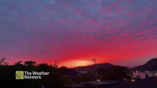 Watch as the dawn sky changes from brilliant red to blue