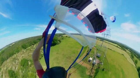 Sunny base jump from low tower