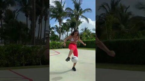 3 grils doing freestyle football tricks.