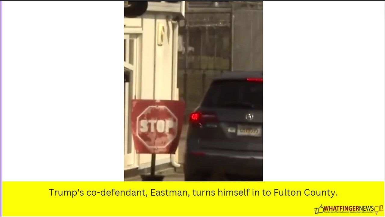 Trump's co-defendant, Eastman, turns himself in to Fulton County.