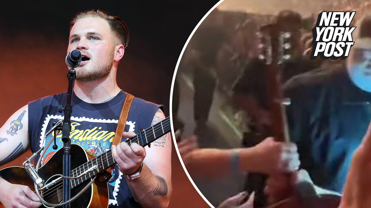 Country star Zach Bryan kicks out concertgoer who tried to take his guitar: 'Took it personal'