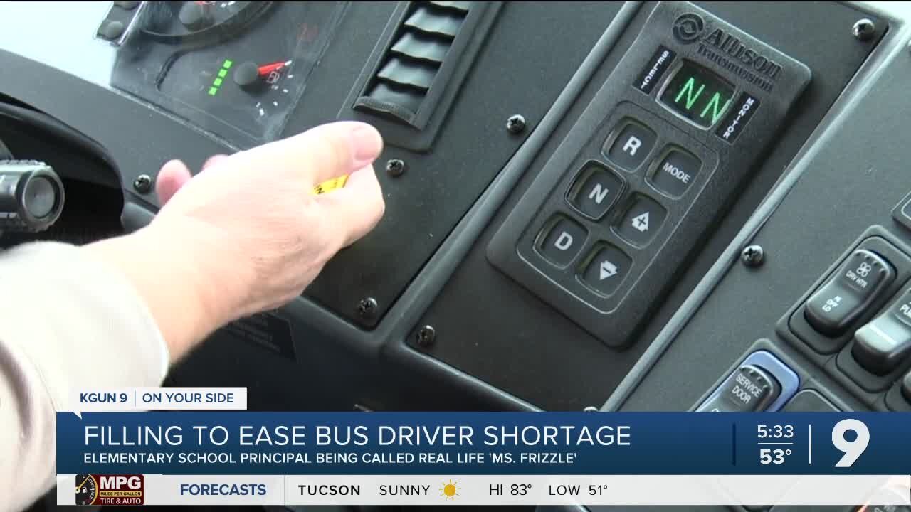 Local principal in the bus driver's seat, bringing field trip opportunities to students