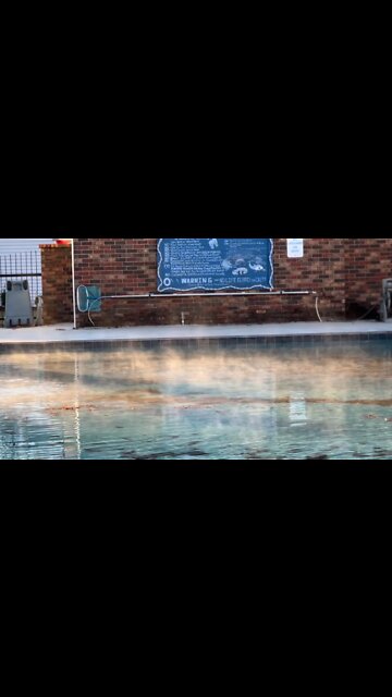 Steam rising from the pool. End of the pool season