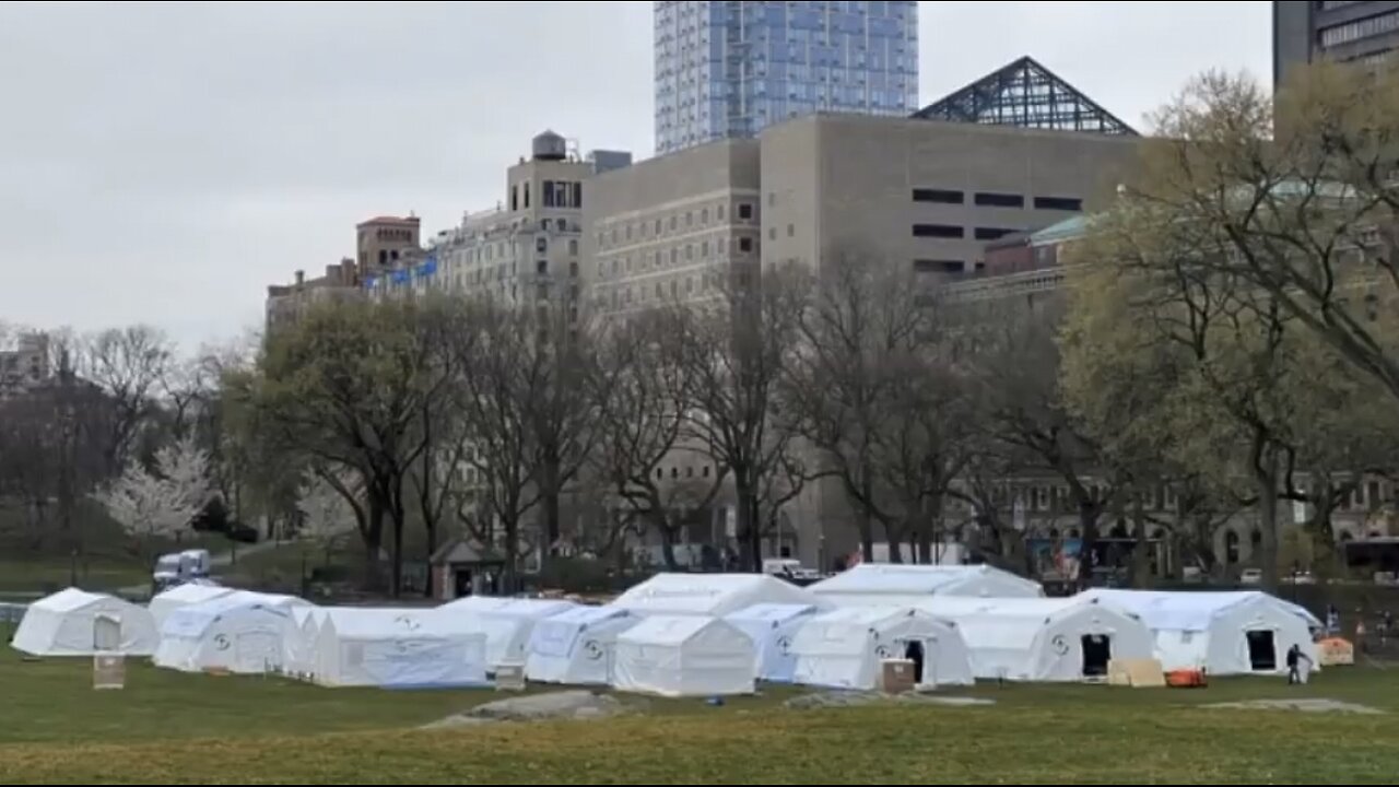 tents in central park NYC - military bringing children up from the underground