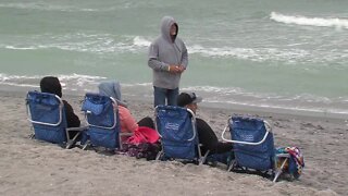 Waterfest presses on despite weather, red tide