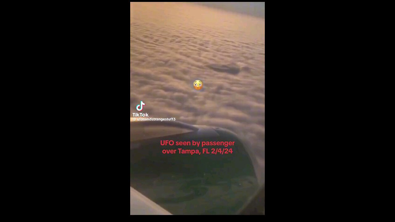 UFO seen over clouds
